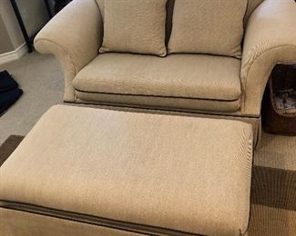 Sleeper couch folds out to a single bed with matching ottoman.  Newly reupholstered and in excellent condition