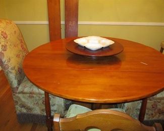 table with lazy susan and leafs