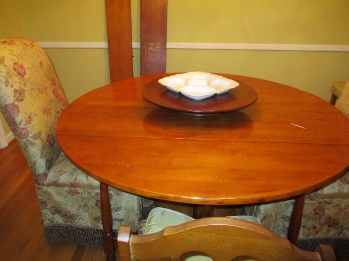 table with lazy susan and leafs