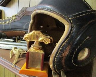 leather helmet & racing trophy