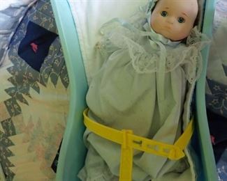 BABY DOLL IN CARRIER