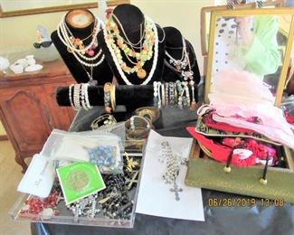TABLES FILLED WITH COSTUME JEWELRY