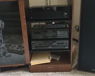 Stero in Cabinet with speakers