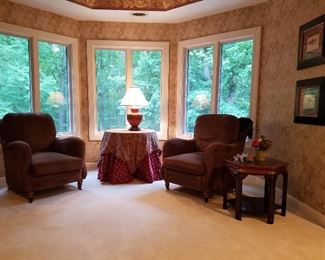 Matching soft arm chairs, lamp tables, art