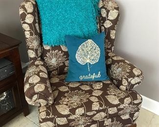 Wing back chair - it has a tinge of turquoise in it!