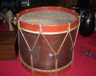 painted wooden drum with bone eyelets