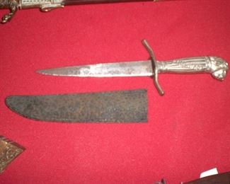 lion head dagger marked courage and conquest
