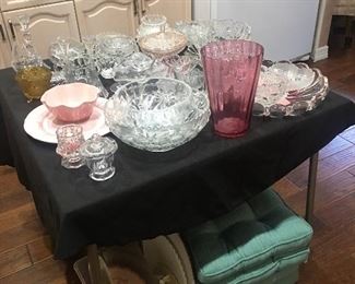 Lots of great treasures in the kitchen- clear & pink serving ware & vases, mint green cushions, cake de orating supplies