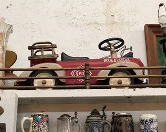 Antique red child's metal fire engine car