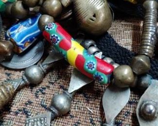 Stunning brass bell necklace with handmade glass beads