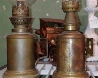 French oil lamp is made of brass plated metal engraved with French words and phrases.