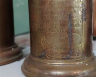 French oil lamp is made of brass plated metal engraved with French words and phrases.