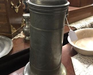 19TH CENTURY GERMAN PEWTER PRESENTATION STEIN A good quality German lidded pewter presentation stein. The body engraved to the Becker Associates for their fine handywork from a store owner Johanes Meyr in 1817. Size: 12.5" total