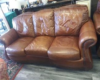 Leather nailhead sofa , loveseat and armchair