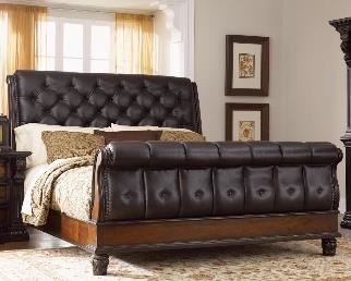 Ashley furniture leather tufted bedframe