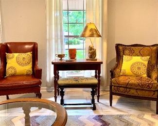 Needle point bench
Leather wingback chair
Nice accessories