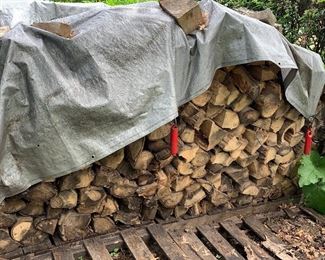 large pile of wood (there are two of them for sale)