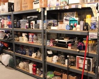 ABSOLUTELY PACKED BASEMENT WITH SHELVING.