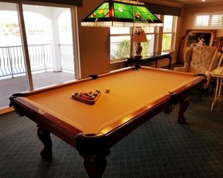 8-ft table. Includes balls and cue sticks.