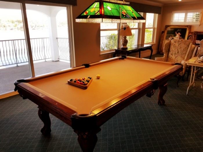 8-ft table.  Includes balls and cue sticks.
