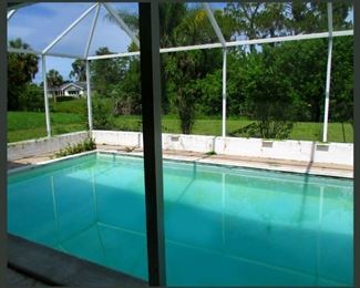 The 1960's Home is also for Sale! Showing the Pool View and Spacious Back Yard 