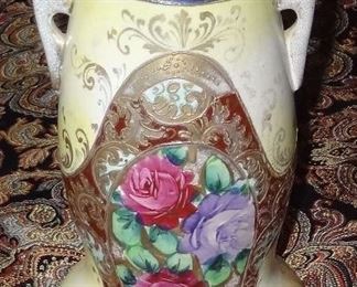 Exquisite tall antique  embossed vase.