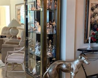 Modern Curio filled with some of the Lladro Collection