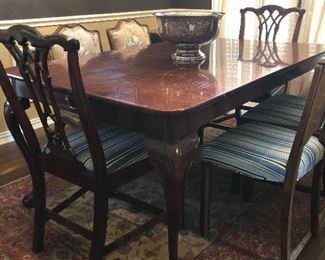 Henredon Dining Table includes two leaves and 3 Chippendale style chairs.  Also pictured:  two fruitwood chairs and one deco chair.