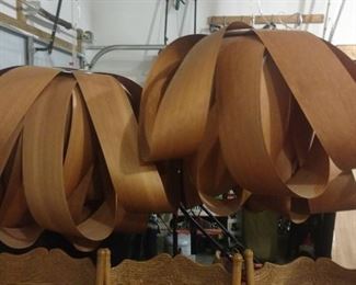 Shaved wood chandeliers. 3 large brown ones available