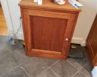 Hardwood artisans cabinet perfect for bathroom. We cleaned it up.