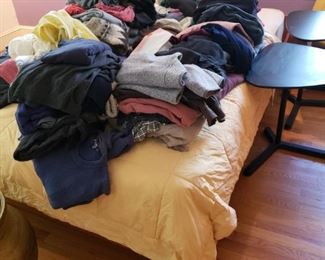 We can't even count how many sweaters we have. Mostly size men's large. (We're also selling the nice yellow quilt and those two ikea tables that go up and down.)