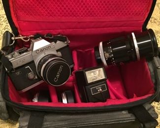 Canon Camera with lenses and case.