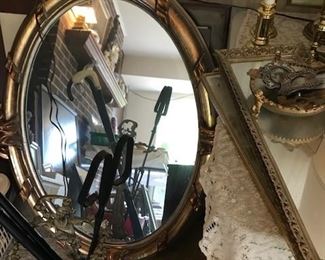 Round Gilded Mirror and Fireplace Set.
