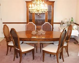 Dining table with six chairs, and china cabinet.  