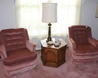 Pair of chairs shown with end table.