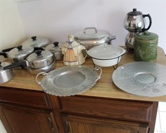 Lots of vintage kitchen items.  Magnalite, hammered aluminum, Shawnee Granny Ann Teapot and Sunbeam Coffee Master.  