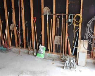 The garage is full of gardening tools.  