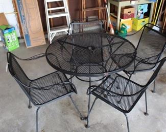 Patio table with four chairs.  