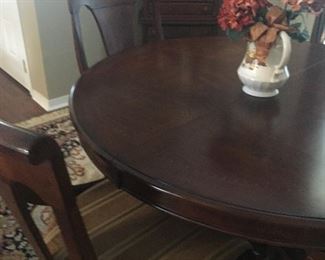 Dining Table with extension ( round or oval) 4 chairs