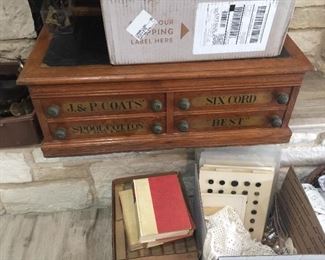 4 drawer antique, sewing spool cabinet with lift top and leather cover. It still has the JP Coats Best Six Cord on front side and labels as seen in pic. $800
