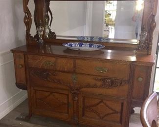 19th century, quarter sawn/tiger oak sideboard with dovetailed drawers, key, brass fixtures, carved features, platter drawers (a new picture will be uploaded tomorrow with headpiece) $2900