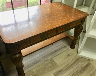 Antique, 19th century quarter-sawn/tiger oak library table with lower shelf, and turned & carved legs with brass fixtures. $975