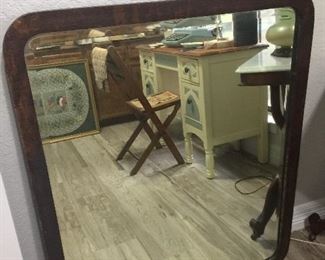 Antique mirror with original silvering and oak trim (missing one piece as seen in bottom left of the picture). It still has horse hair in the back separating the glass and the backing. $100