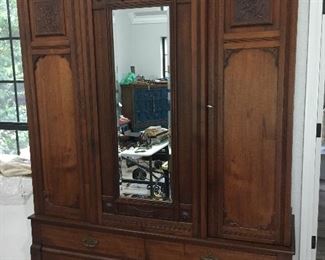 19th century, large Eastlake armoire with shelves and opening on each side. It breaks down into 3 pieces. $1200