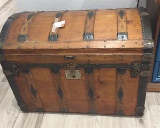 Wow! This 19th century humpback, steamer trunk is one of the most in tact pieces we have seen.