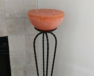 Candle on tall stand