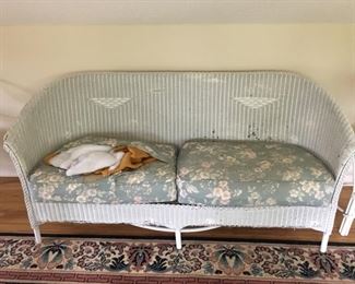 Wicker Couch--sturdy but cushion is rough