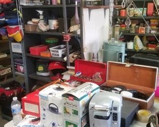 Garage stuffed with all types of tools, plumbing supplies, andceverything else