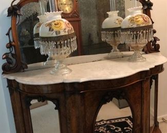 Entry marble piece and parlor oil lamps with prisms