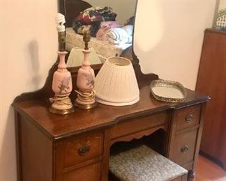 twin beds, dresser, vanity, bench all match